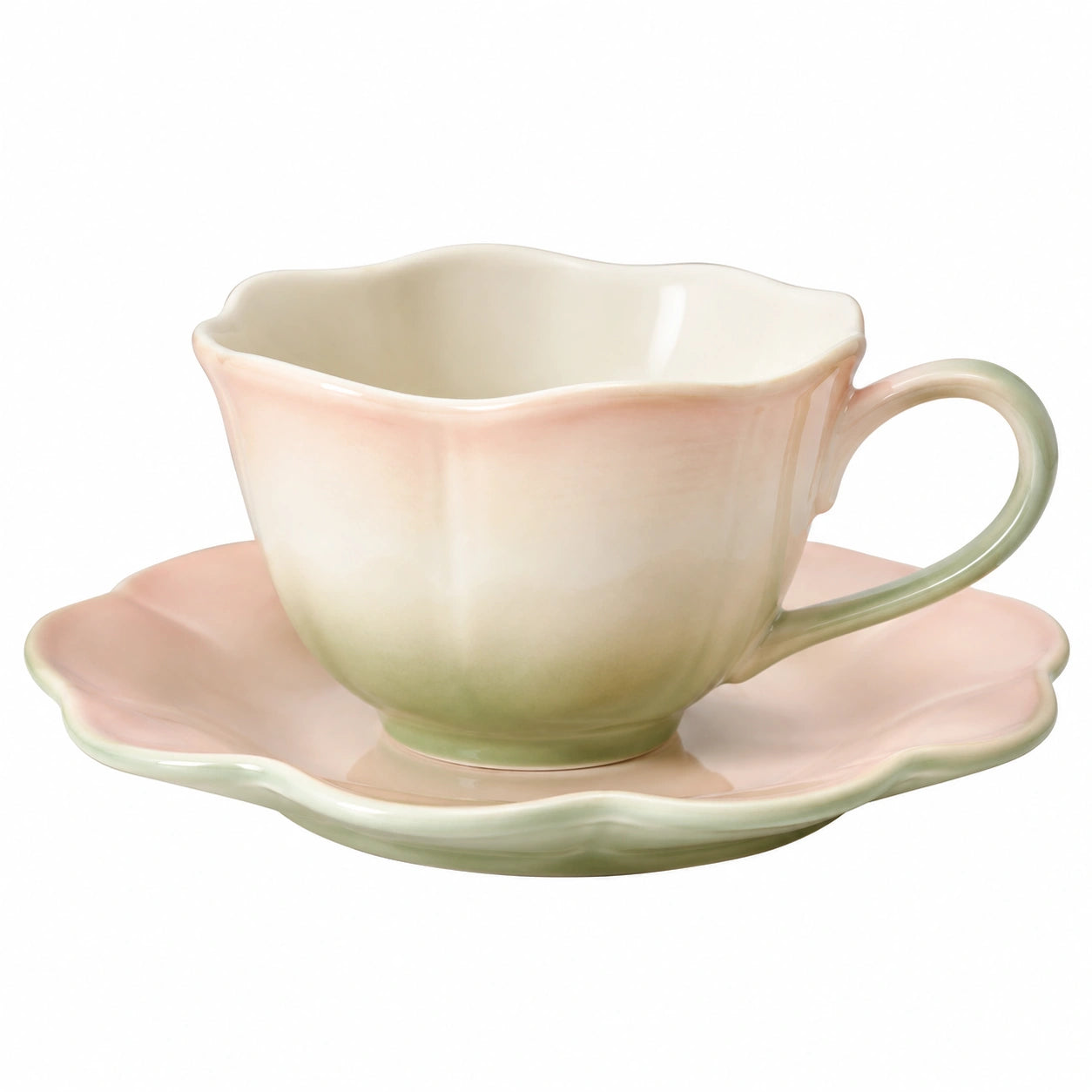 Keramische Teetasse mit Untertasse in Blütenform Grün/Rosa
